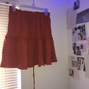 red/orange skirt